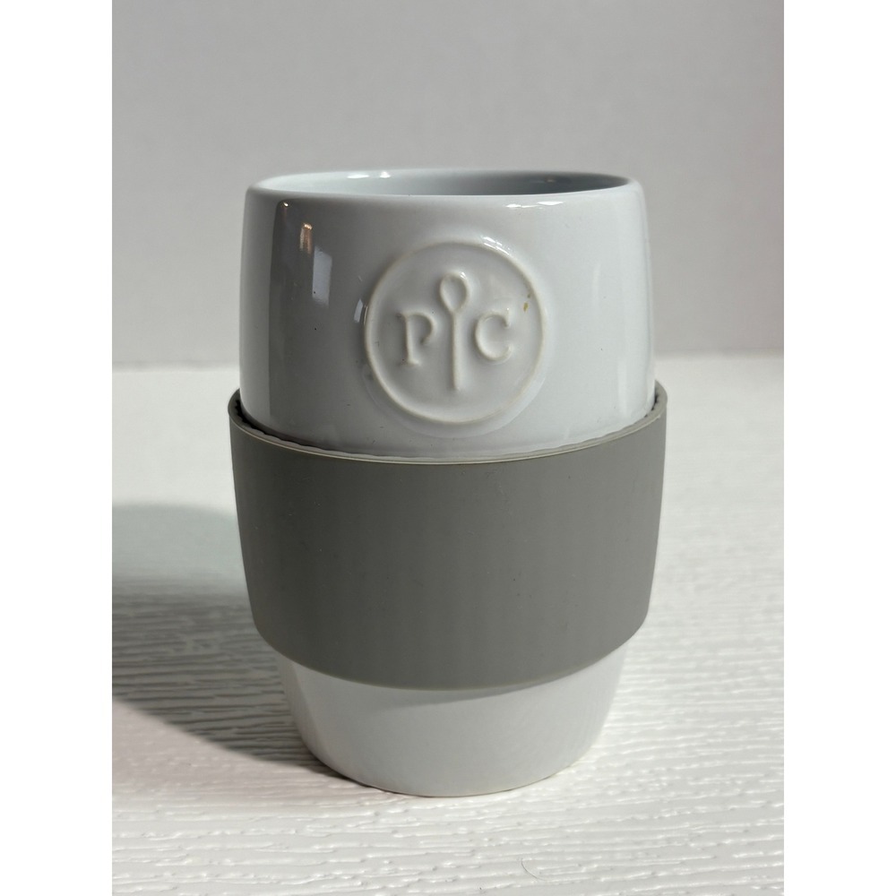 Pampered Chef White Ceramic with Grey Silicone Sleeve Logo Tumbler S0140